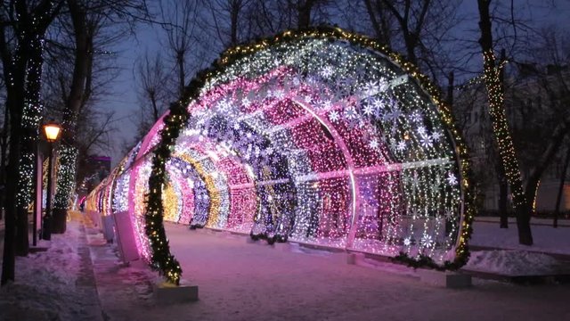 Christmas night on Tverskoy Boulevard in Moscow. Glowing decorative tunnel