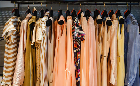 Clothes on racks in a fashion boutique