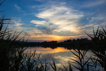 Fototapeta na wymiar landscape pond sunset