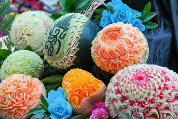 Fresh carved pumpkins and melons decorated by Thai carver