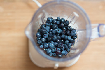 Ripe blueberry in blender