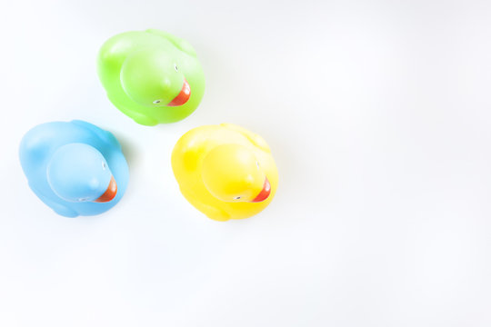 Rubber ducks on a white background