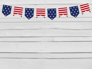 Party flags on wooden background. 4th July, Independence day, card, invitation in usa flag colors....