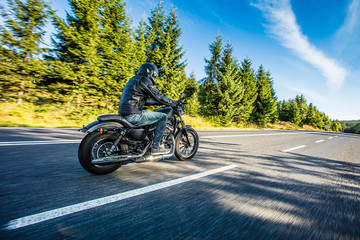 Man riding the motorcycle. On the road!