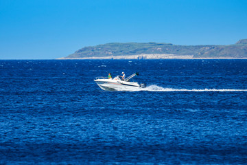 Motor boat in blue Adriatic sea, Croatia