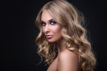 Fototapeta premium Blonde woman with curly hair