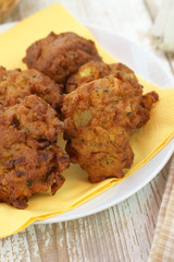 Onion Bhajis a spicy Indian snack of onions fried in batter