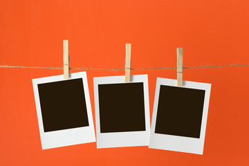 Photos hanging on rope