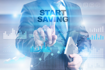Businessman is pressing button on touch screen interface and selecting "Start saving".