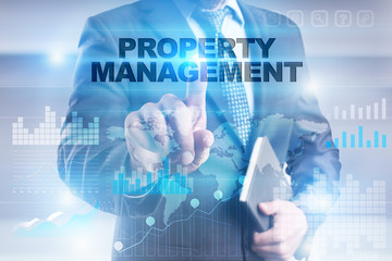 Fototapeta premium Businessman is pressing button on touch screen interface and selecting 