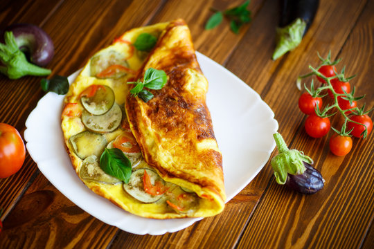 fried omelet with eggplant and tomatoes