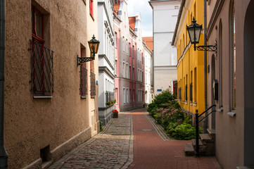 Narrow medieval street in the old Riga city
