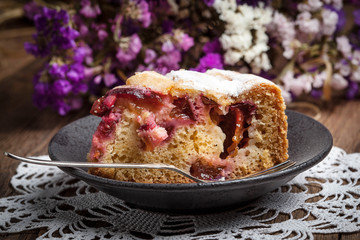 Piece of homemade fresh plum cake.