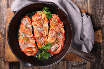 baked aubergine with ham and tomato