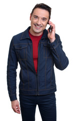 Fototapeta premium smiling young man talking on mobile phone. Isolated