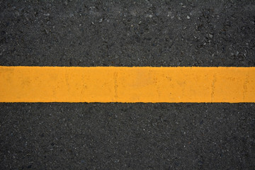 Background yellow line on the road