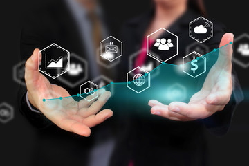 Business team holding social icons.business concept.social media