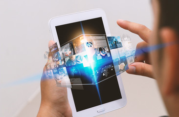 Businessman using digital tablet,social media concept.