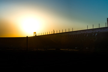 Obraz premium Sunset near the Itaipu dam on river Parana