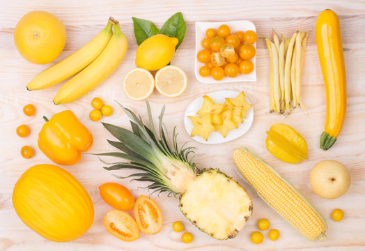 Yellow fruit and vegetables, top view
