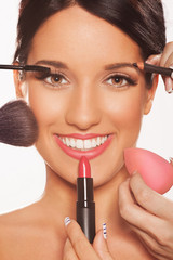 Young woman getting professional beauty and makeup treatment