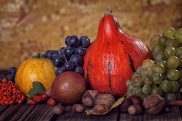 Autumn fruit and vegetable on wooden table 