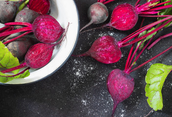 Fresh beets on a black background for frying