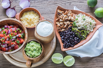 Chicken burrito bowl with the ingredients