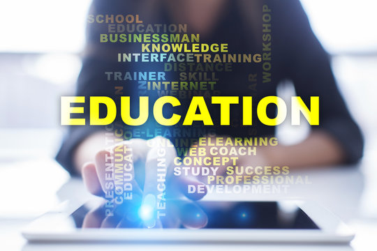 Womans pressing button on teblet and select Education Words Cloud. 