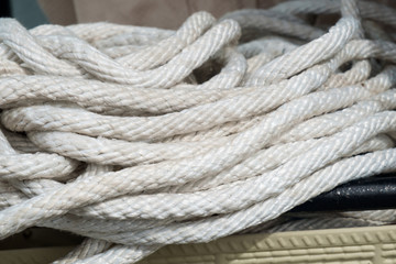 Fototapeta na wymiar White rope / Close up of white rope.