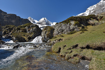 Fototapeta na wymiar Torrent with the waterfalls on the plateau Maillet
