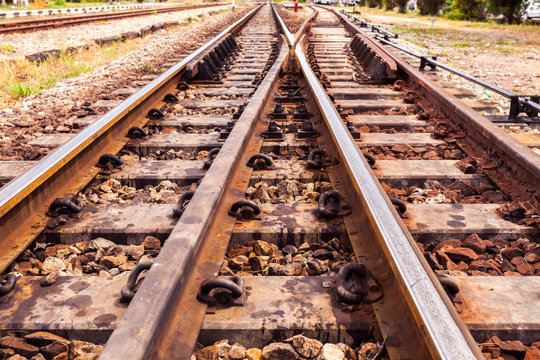 Close up the rusted train tracks