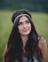 Fototapeta premium Portrait of beautiful young woman in nature