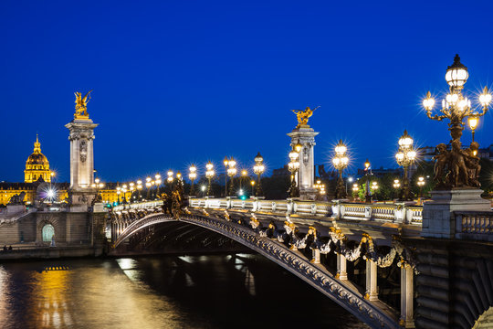 Fototapeta Pont Alexandre III bridge over river Seine with beautiful night