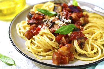 Spaghetti with eggplants end tomato sauce.