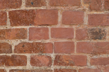 Fototapeta premium Red brick dirty wall.