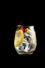 Tom Collins cocktails on black background