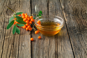 rowan berries on wooden table