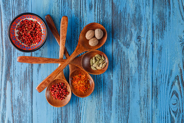 Spices on blue table