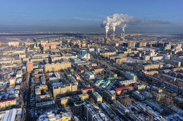 Tyumen, Russia - November 10, 2015: Aerial view on residential area and combined heat and power factory on background
