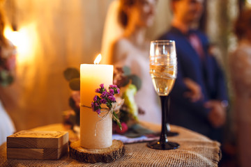 Beautiful decorated wedding table. candles on the table during the evening wedding dinner
