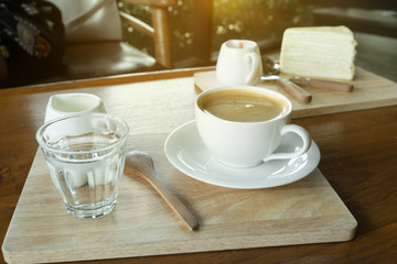 Coffee set with dessert on table