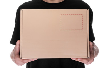 Delivery man holding a cardbox.