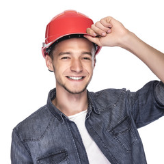 Young man in a construction helmet.