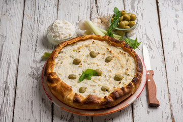 salted cake with ricotta green olives and mint