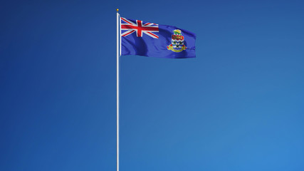 Cayman Islands flag waving against clean blue sky, long shot, isolated with clipping path mask alpha channel transparency