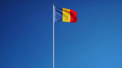 Chad flag waving against clean blue sky, long shot, isolated with clipping path mask alpha channel transparency