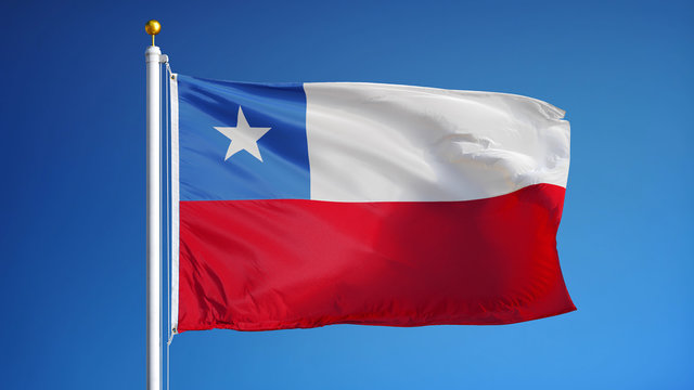Chile flag waving against clean blue sky, close up, isolated with clipping path mask alpha channel transparency