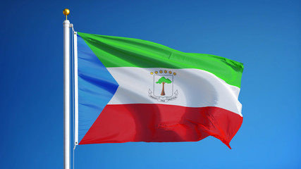 Equatorial Guinea flag waving against clean blue sky, close up, isolated with clipping path mask alpha channel transparency