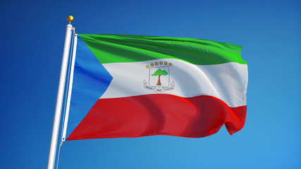 Equatorial Guinea flag waving against clean blue sky, close up, isolated with clipping path mask alpha channel transparency